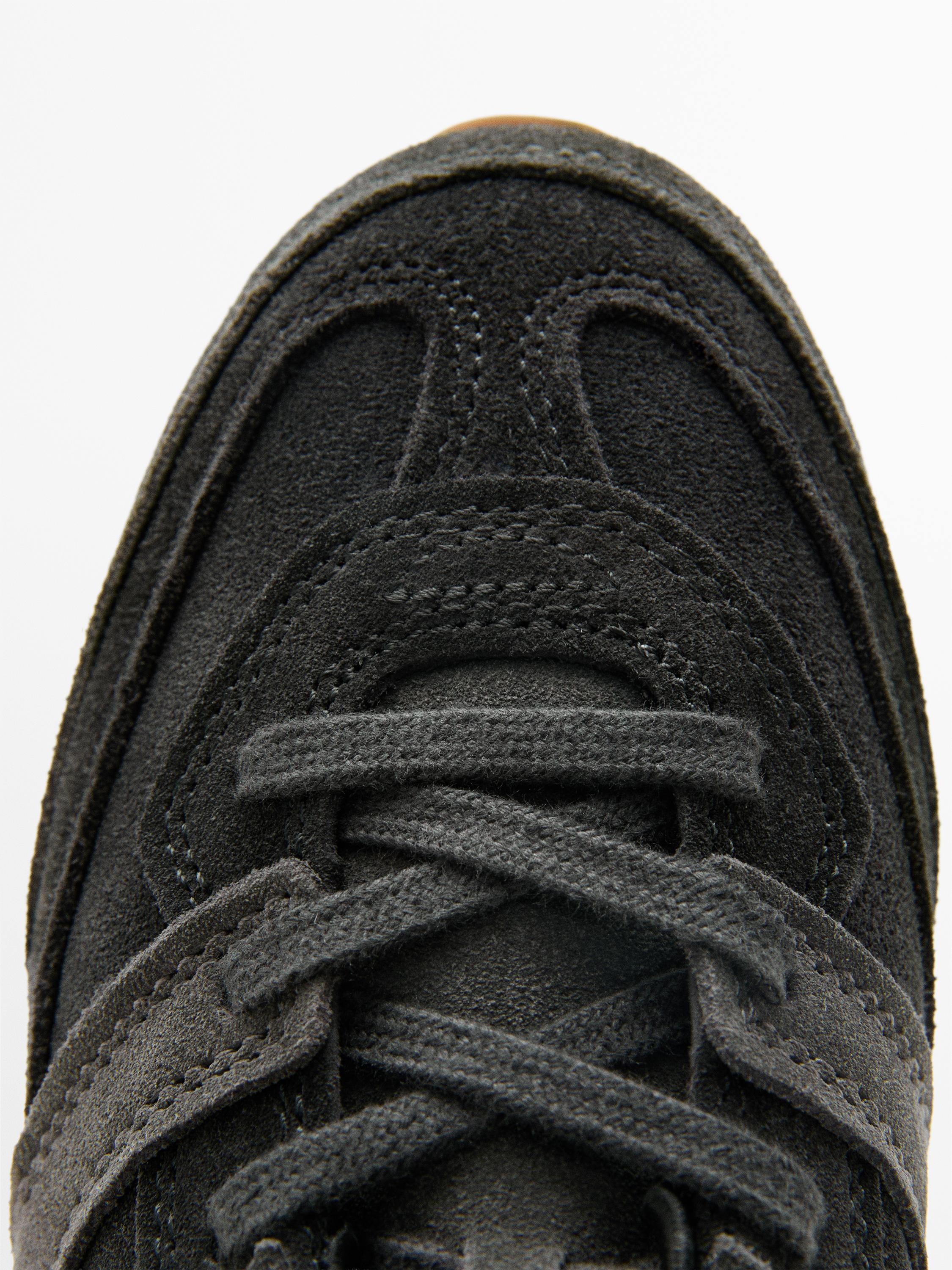 Tennis cuir contrastant